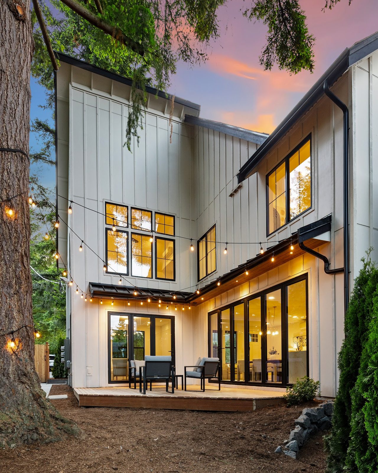 A Stay Flourish–managed Puget Sound short-term rental home at twilight, representative of the properties we manage